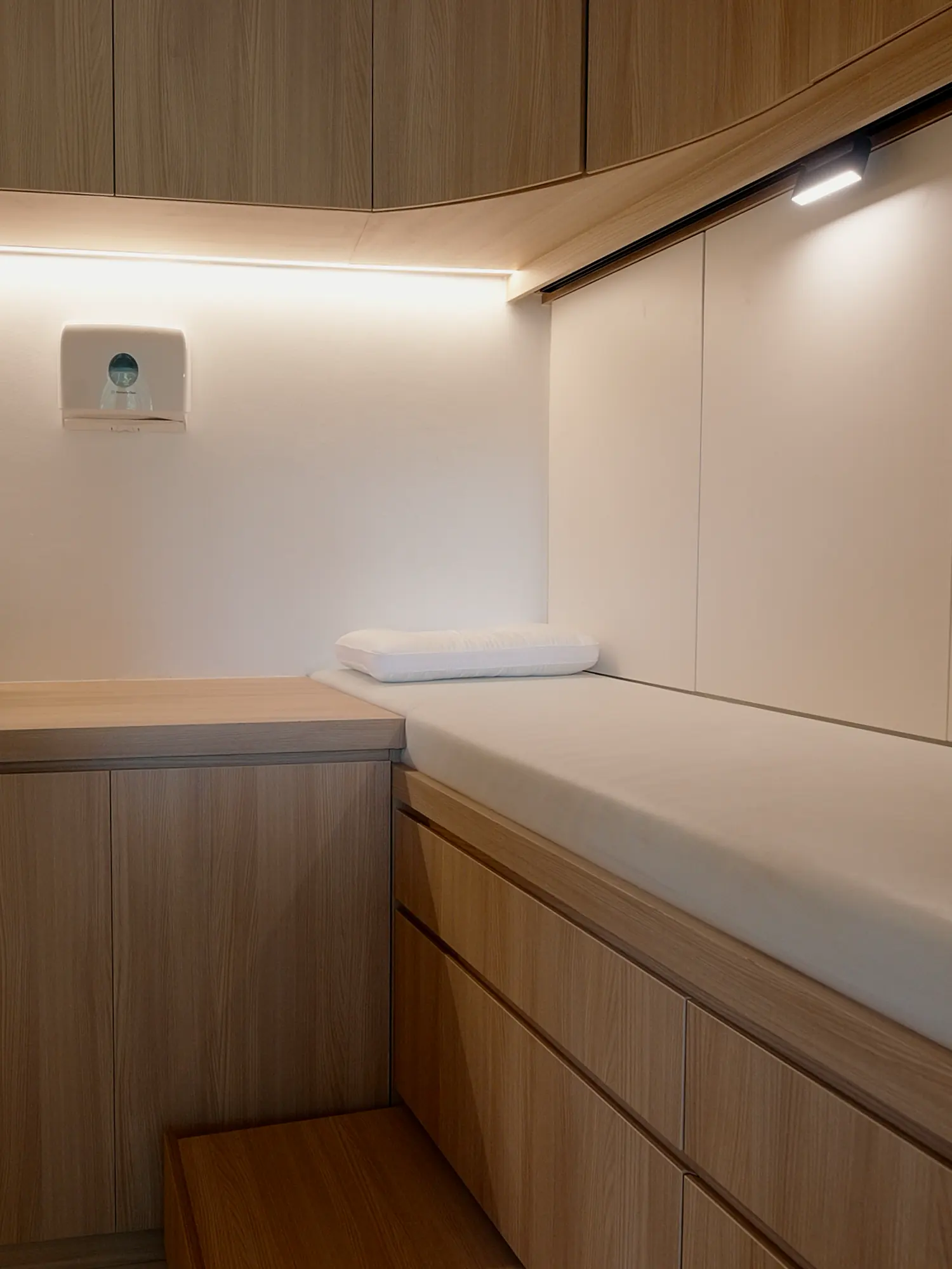The treatment bay, full-height cabinetry keeping equipment out of sight